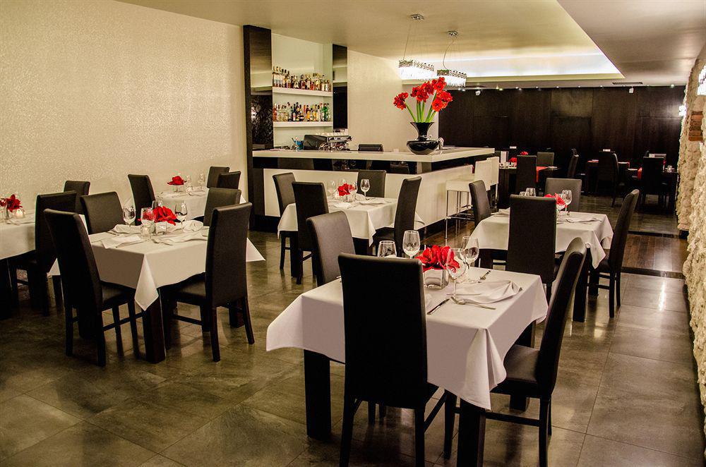 Queen Boutique Hotel, at the table