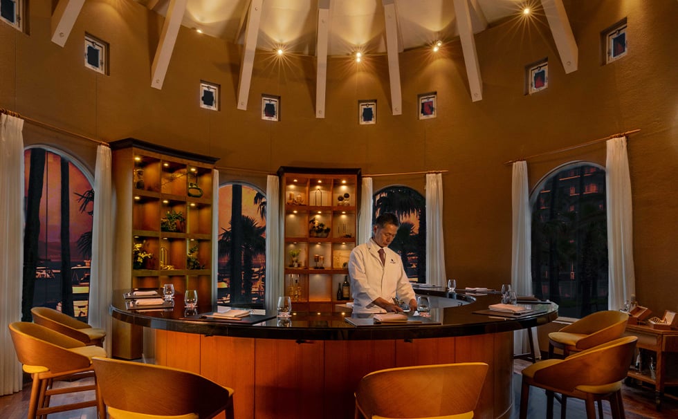 Malibu Hotel, at the table