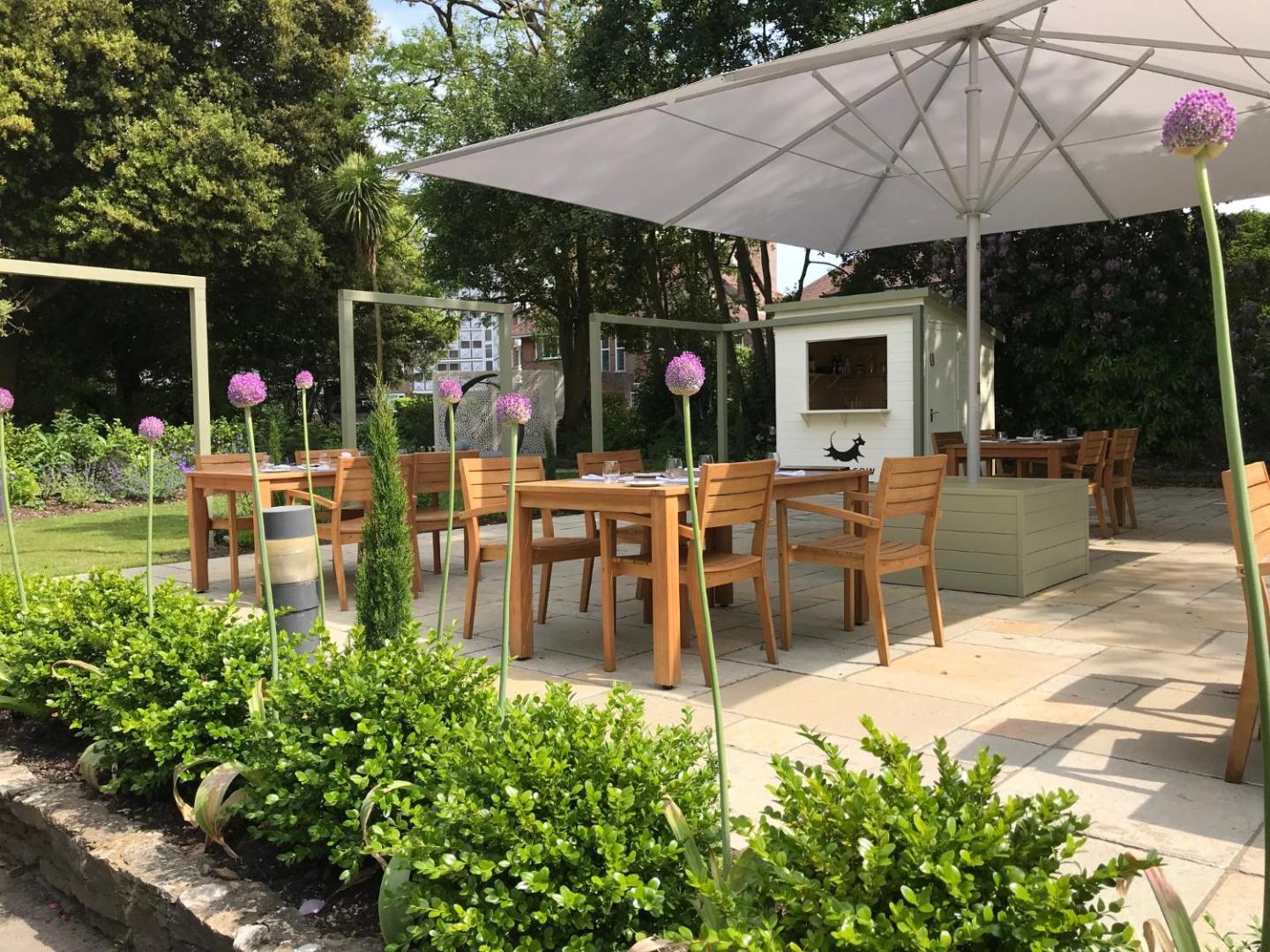 The Green House, at the table