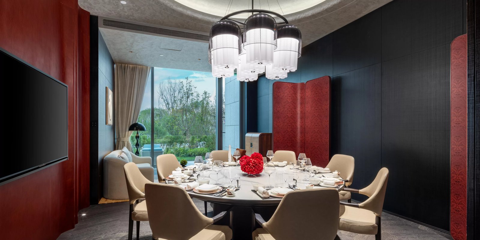 Intercontinental Yining By Ihg, at the table