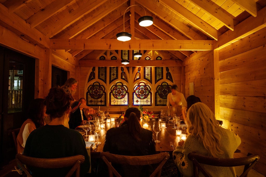The August House, at the table