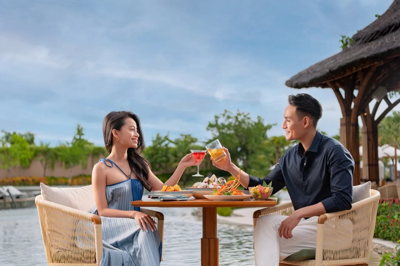 New World Hoiana Beach Resort, at the table