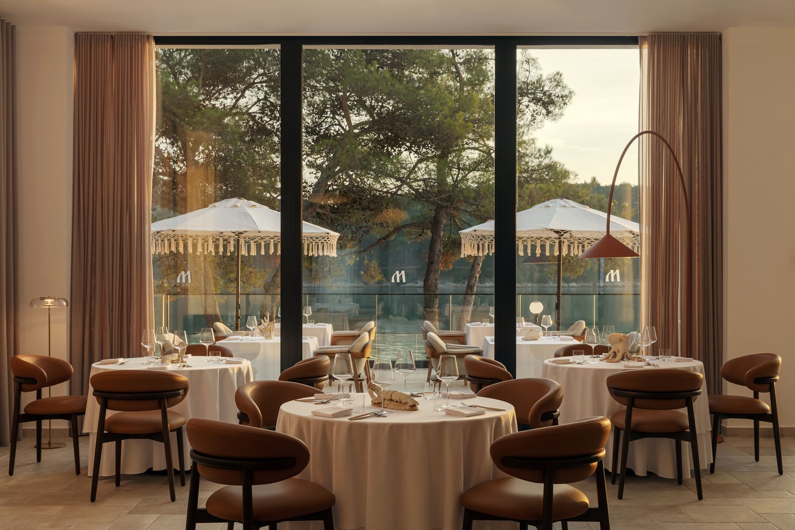 The Isolano, Cres, Autograph Collection, at the table