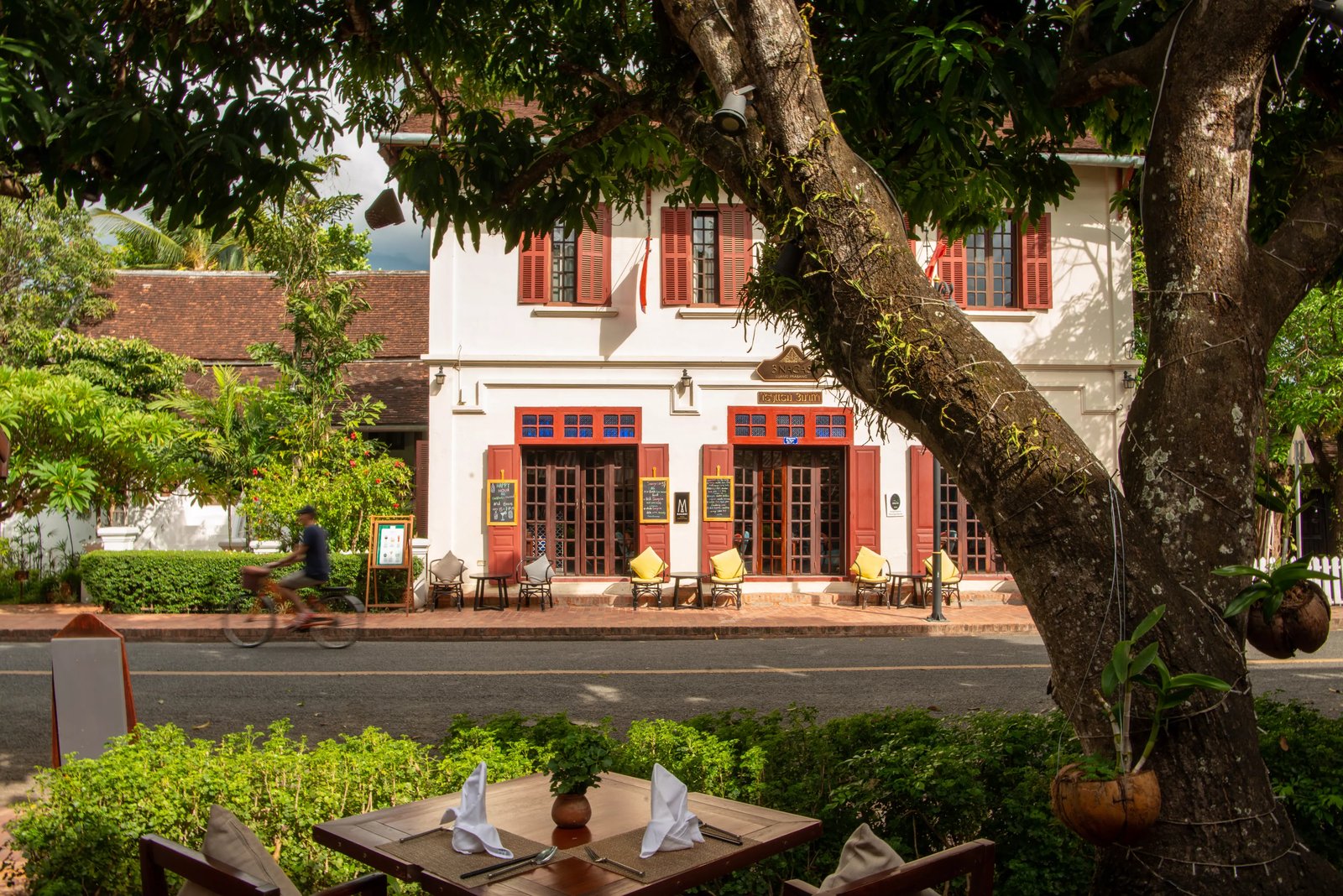 3 Nagas Hotel Luang Prabang - MGallery Collection, at the table