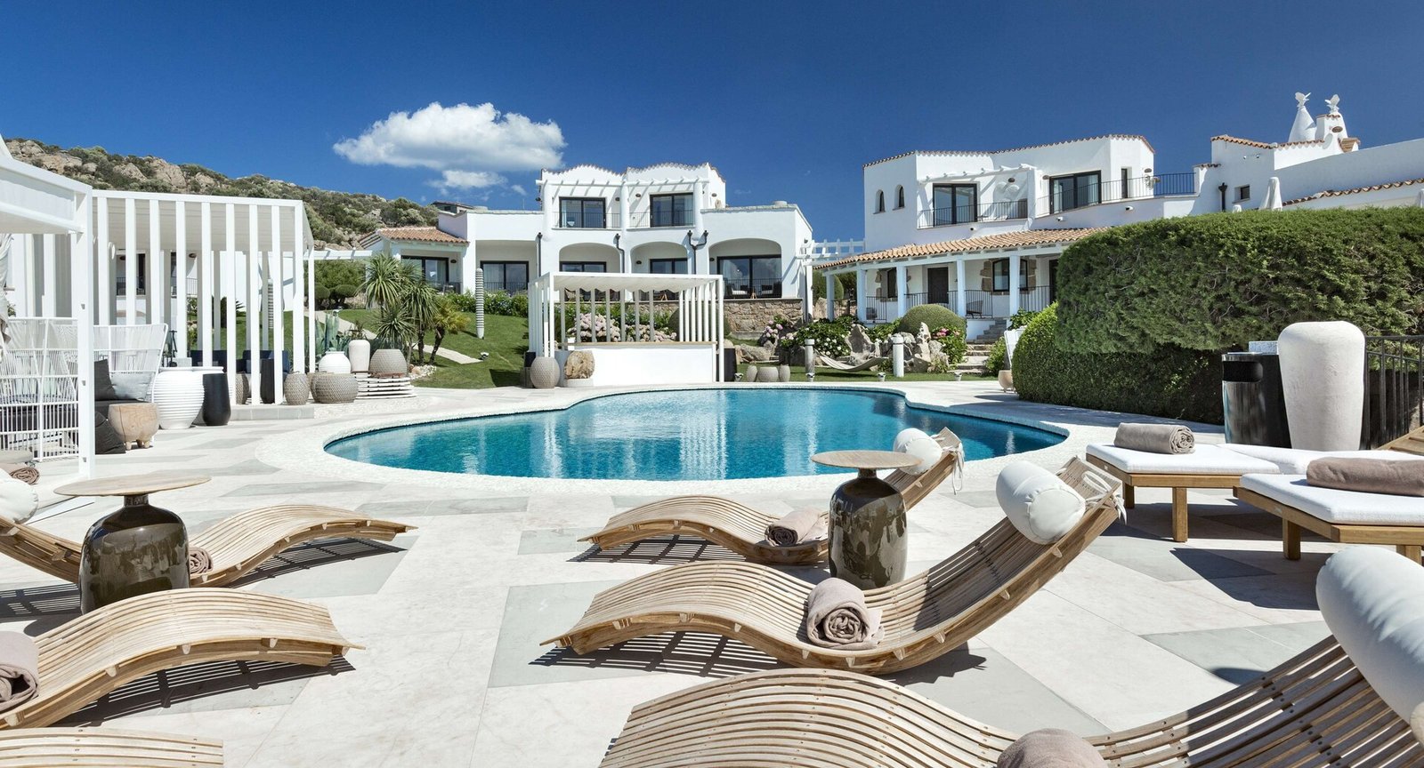 Sulia House Porto Rotondo, Curio Collection by Hilton, the pool