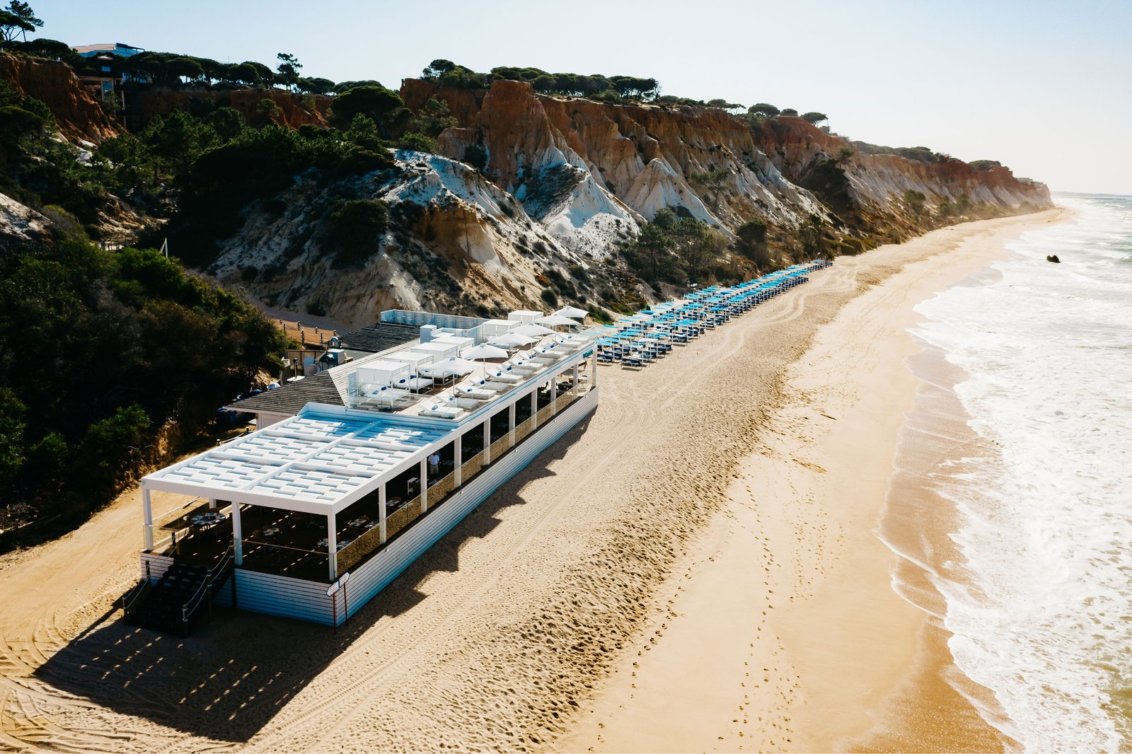 Pine Cliffs Ocean Suites, a Luxury Collection Resort & Spa, Algarve, at the table