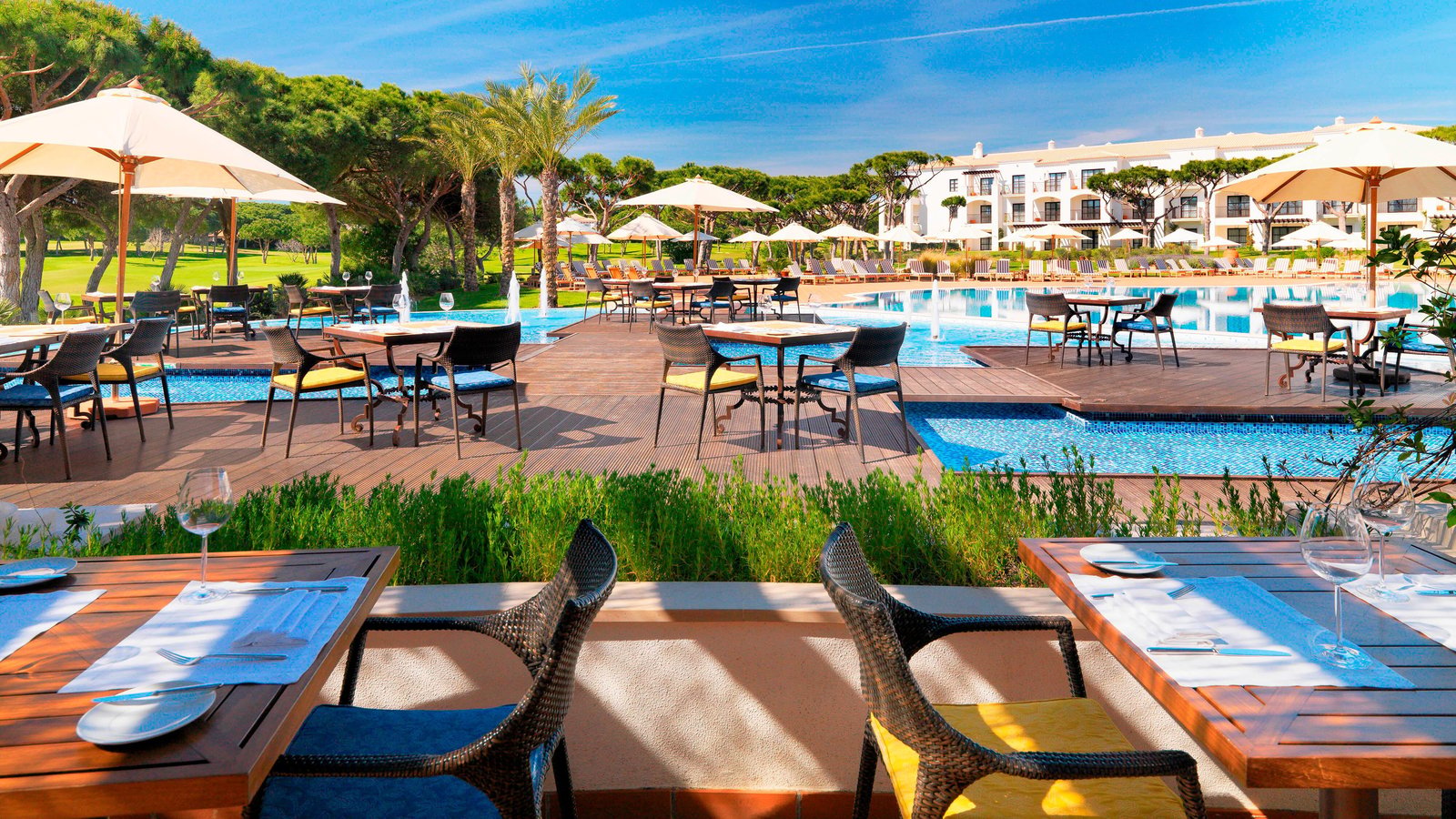 Pine Cliffs Ocean Suites, a Luxury Collection Resort & Spa, Algarve, at the table