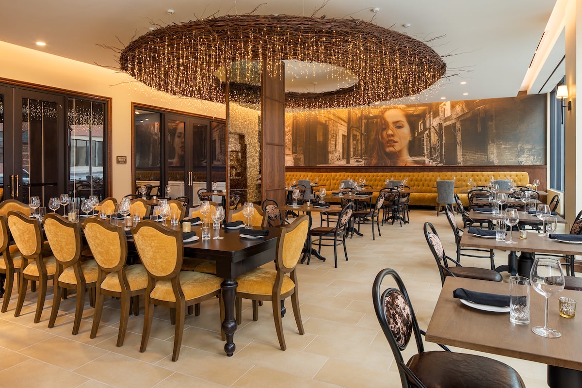 The Peregrine Omaha Downtown, Curio Collection by Hilton, at the table