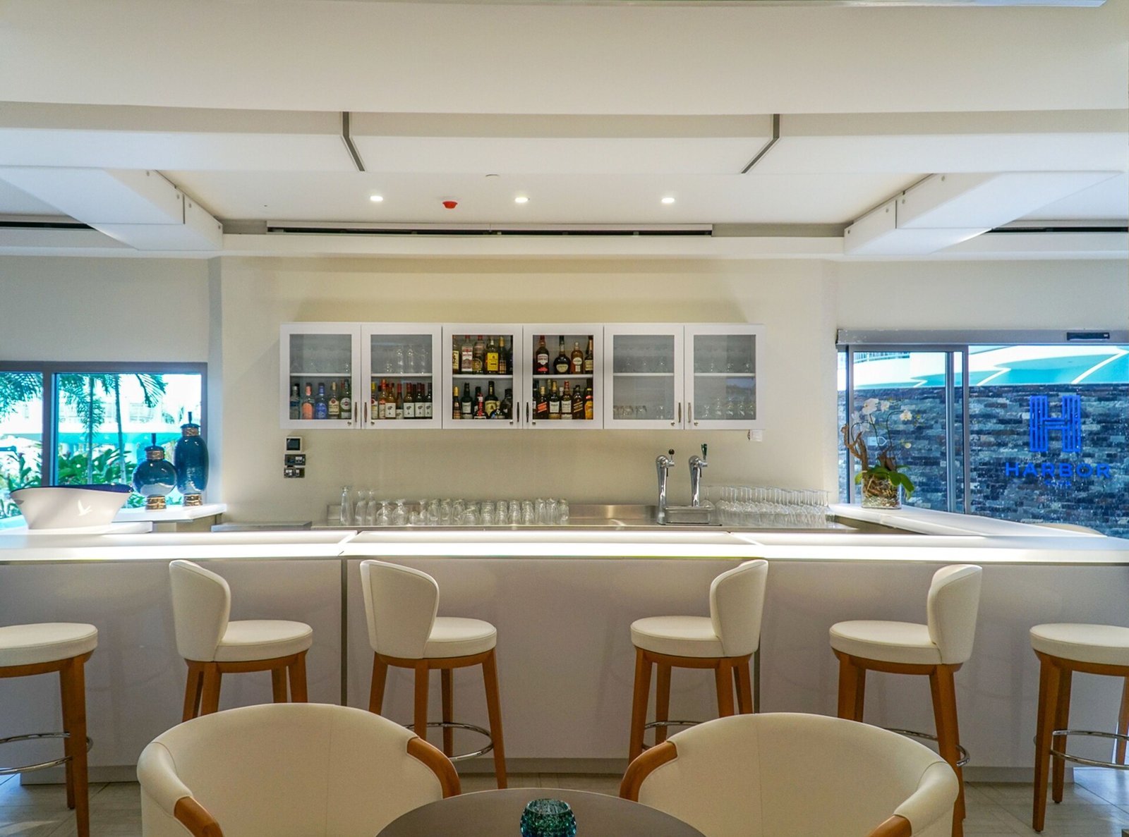 Harbor Club St. Lucia, Curio Collection by Hilton, at the table