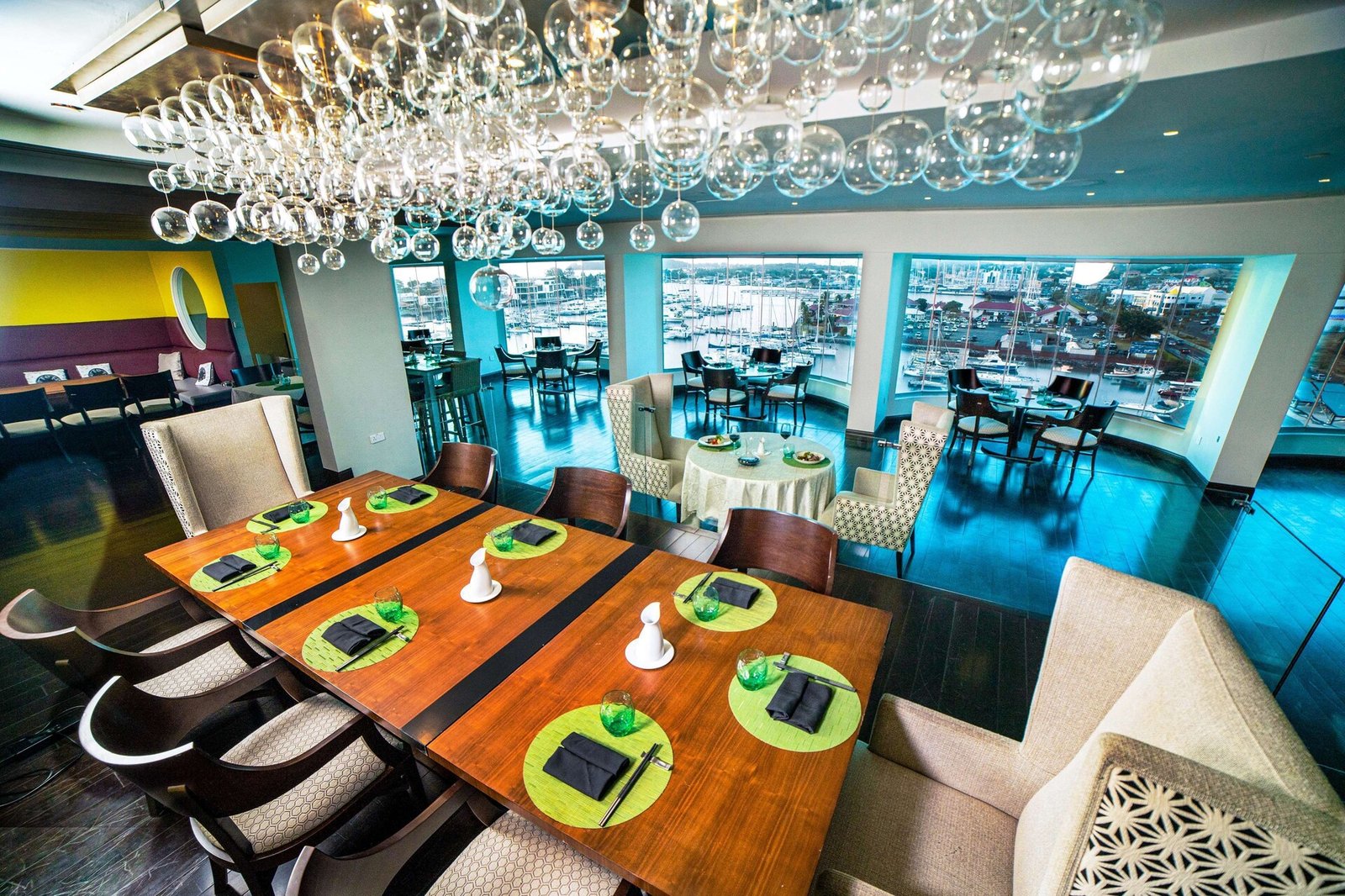 Harbor Club St. Lucia, Curio Collection by Hilton, at the table