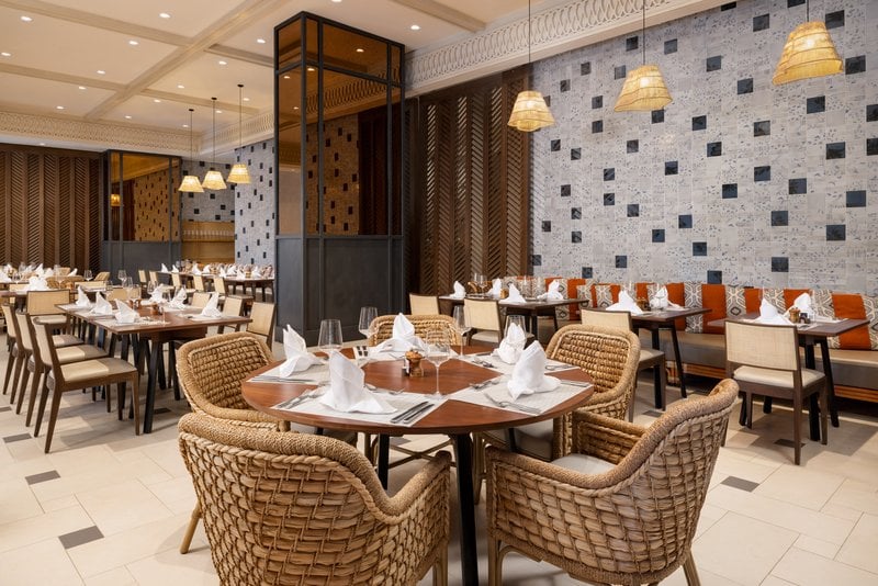 Hotel Santiago, Curio Collection by Hilton, at the table