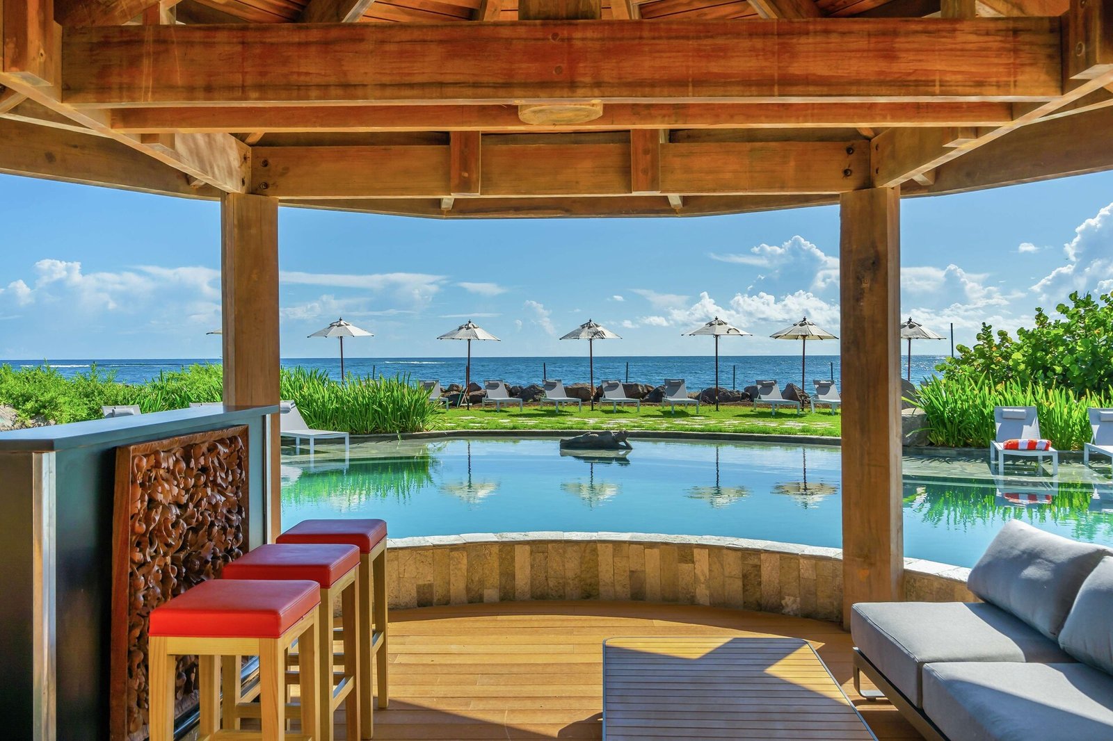Koi Resort Saint Kitts, Curio Collection by Hilton, at the table