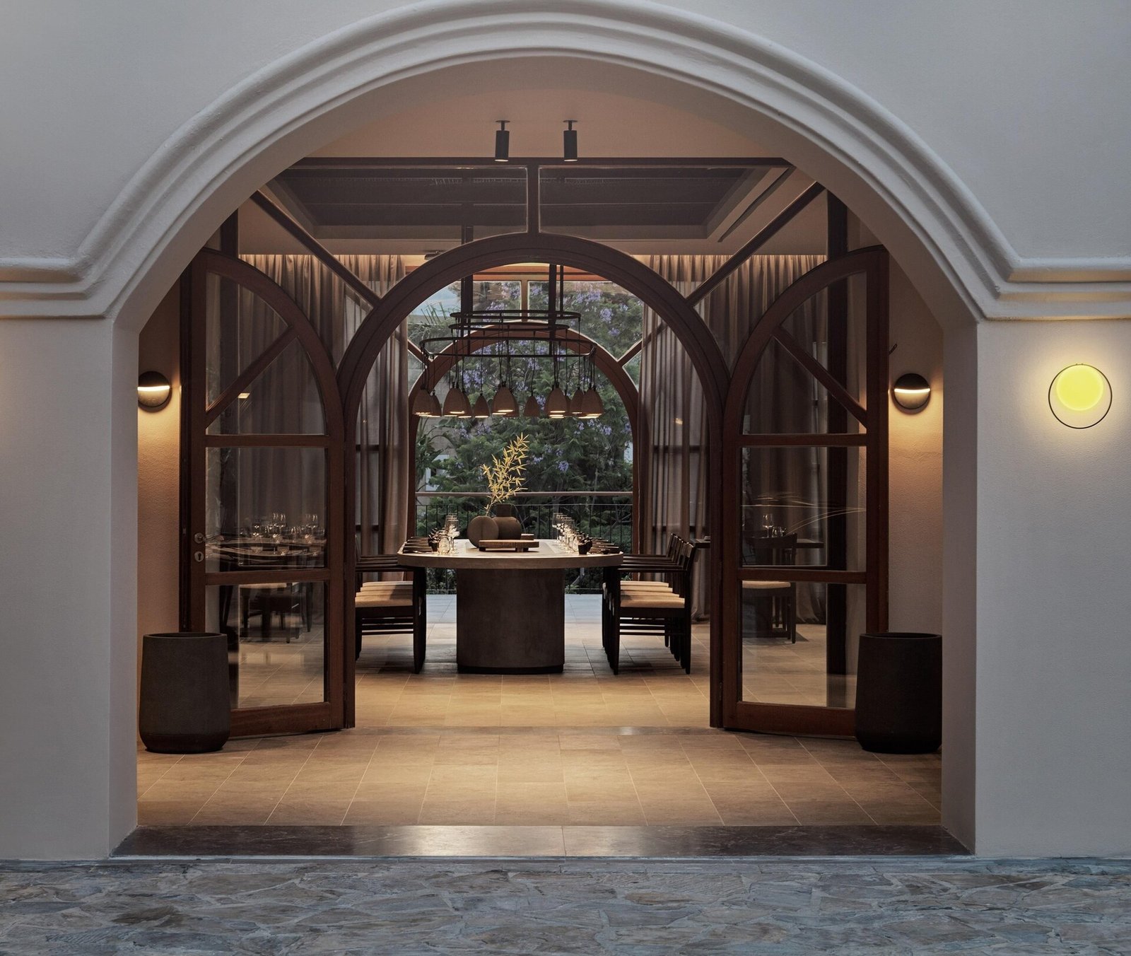 Aulūs Lindos Rhodes Resort, Curio Collection by Hilton, at the table