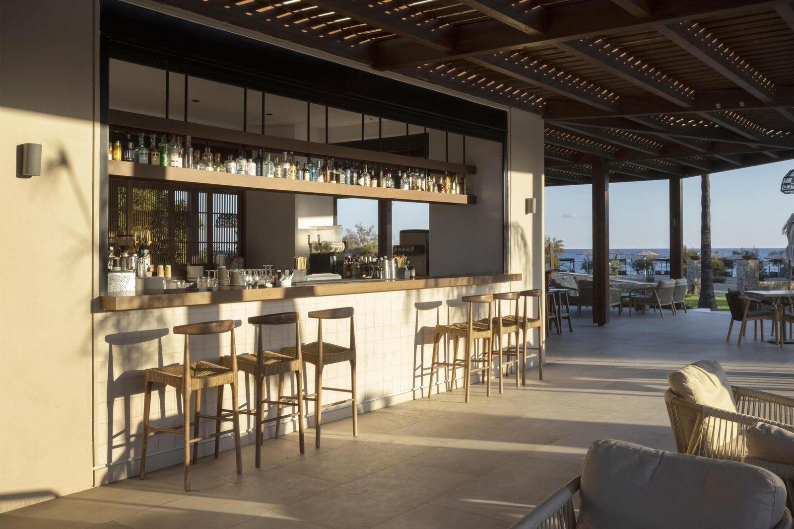 Aulūs Lindos Rhodes Resort, Curio Collection by Hilton, at the table