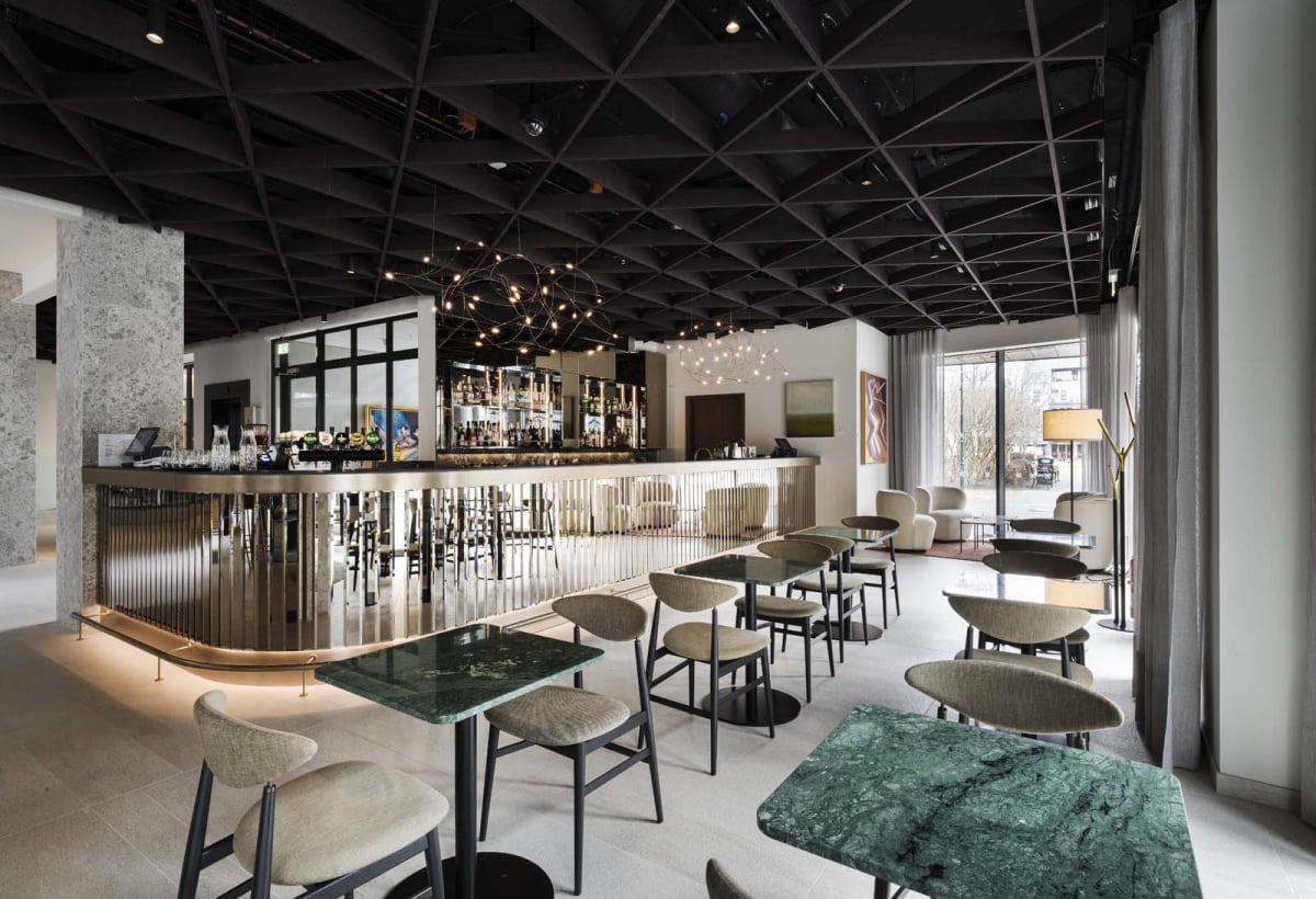 Iceland Parliament Hotel, Curio Collection by Hilton, at the table
