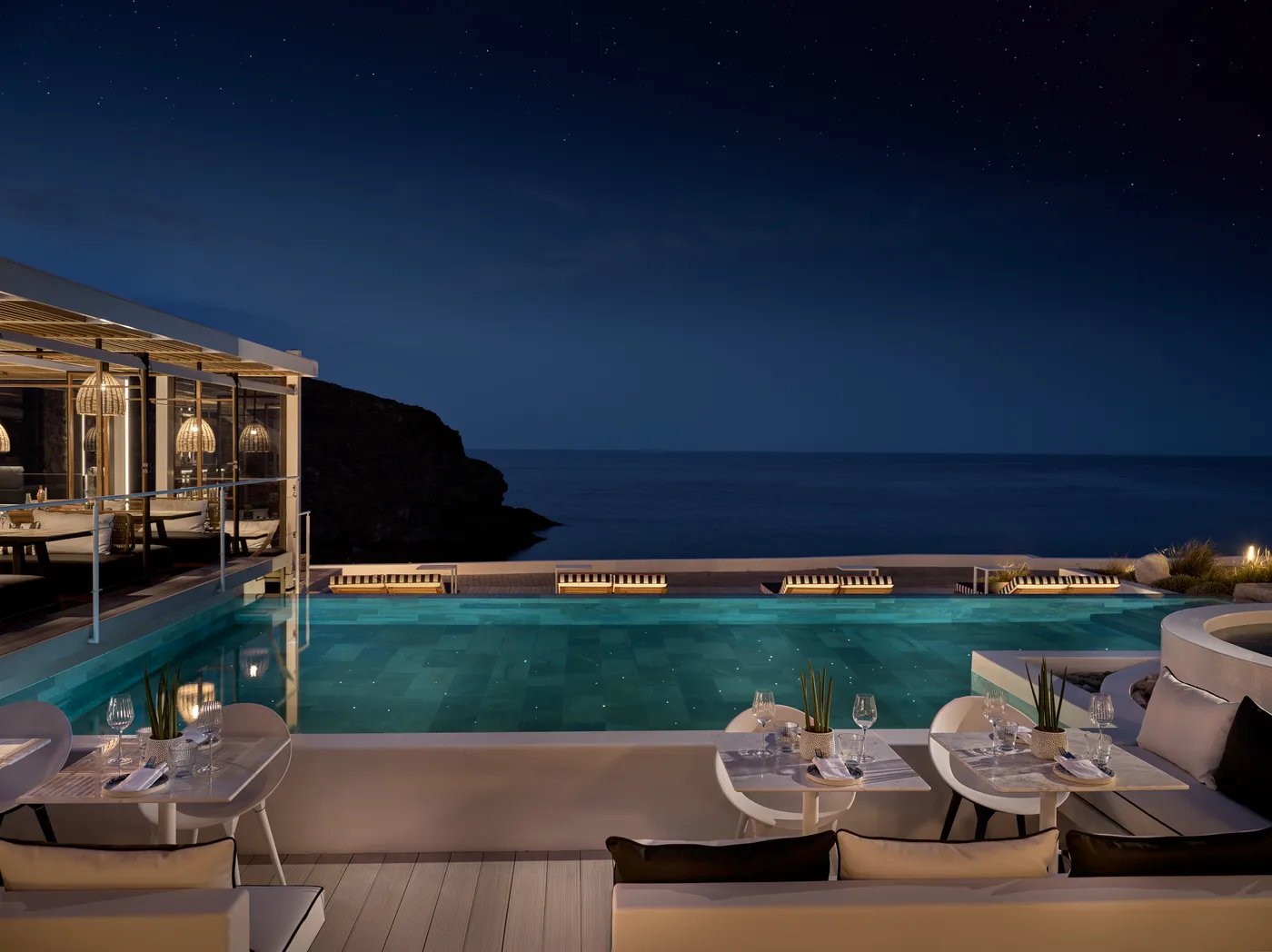Semeli Coast Mykonos, Curio Collection by Hilton, at the table