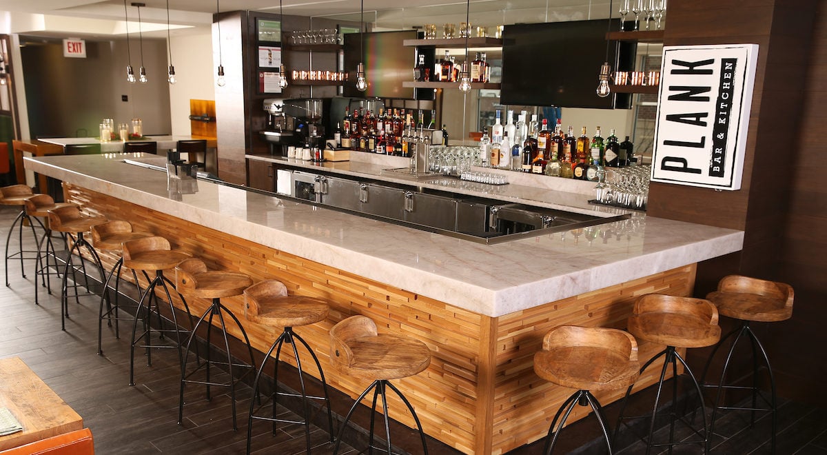 Hotel Indigo Naperville Riverwalk by IHG, plank bar and kitchen