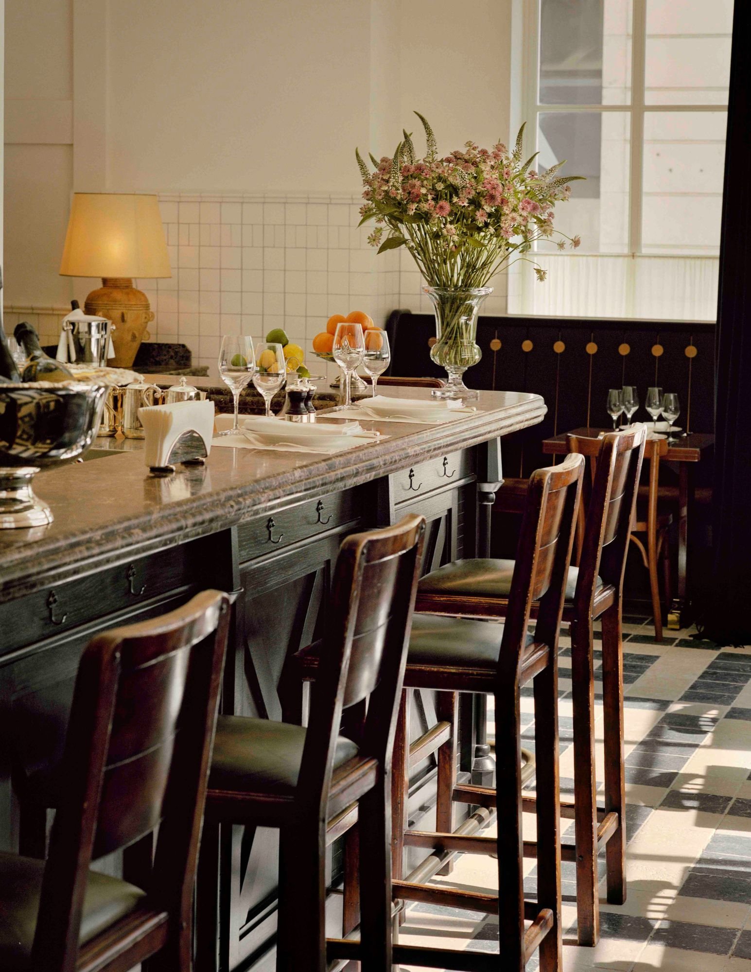 Château Voltaire, at the table
