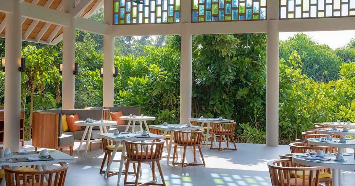 Emerald Faarufushi Resort & Spa, at the table