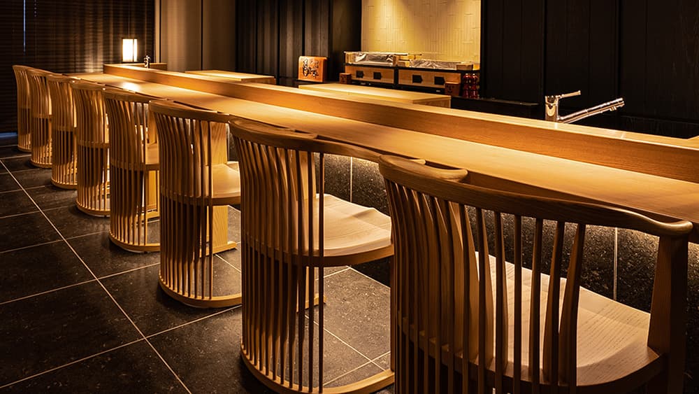 One Suite The Grand, at the table