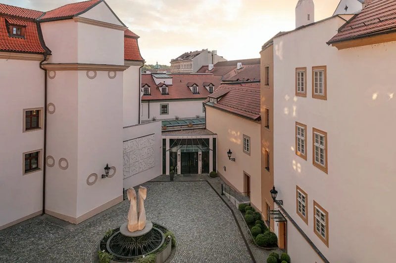 Augustine Hotel, Prague, backstory