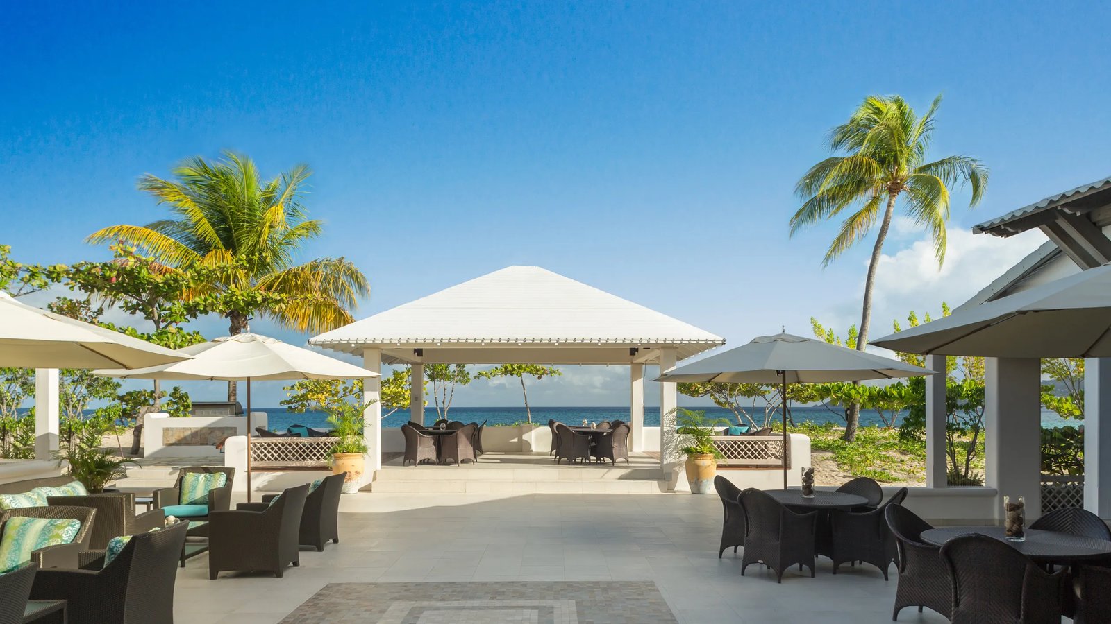 Spice Island Beach Resort, sea and surf terrace and bar