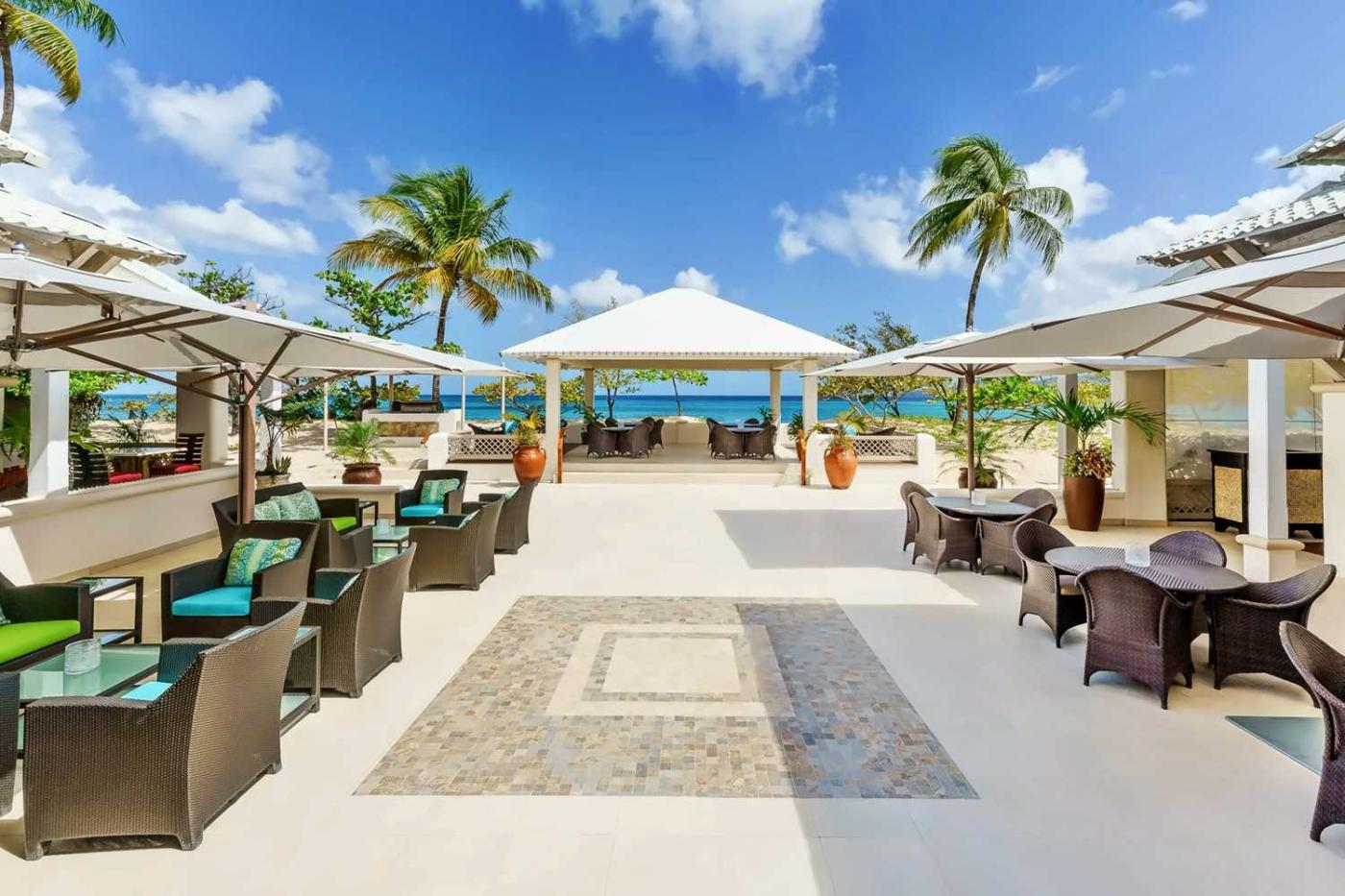 Spice Island Beach Resort, sea and surf terrace and bar