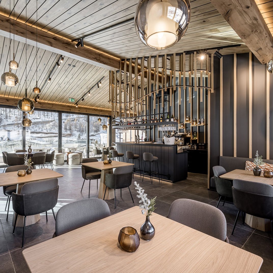 Hotel Das Central - Alpine. Luxury. Life., at the table