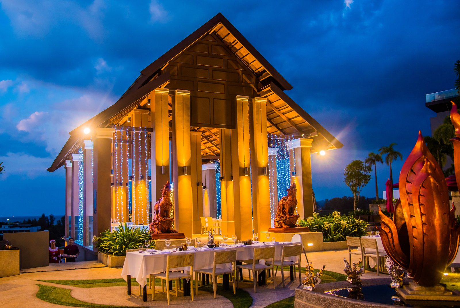 Mida Grande Resort Phuket, at the table