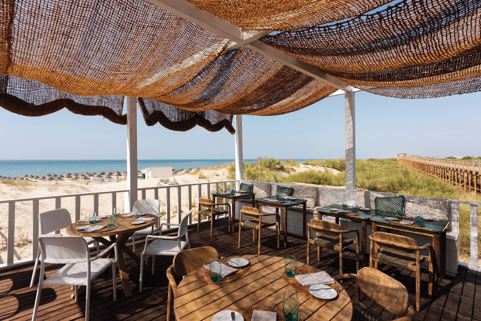 Octant Hotels Praia Verde, at the table