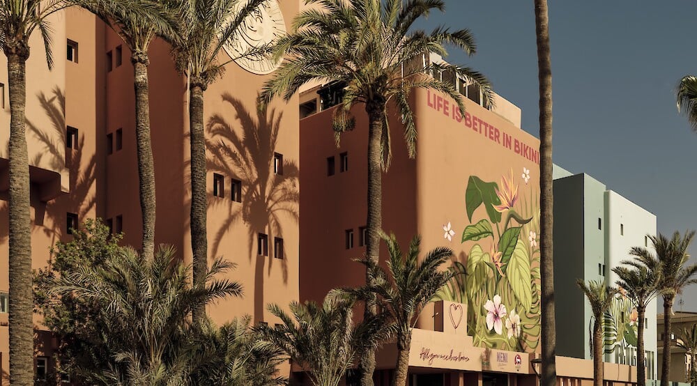 Bikini Island & Mountain Hotel Es Trenc, backstory