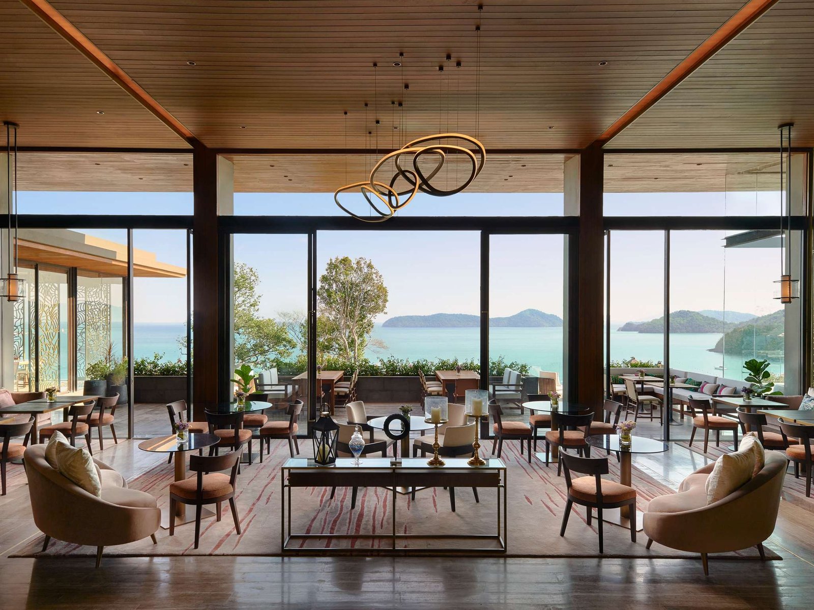 V Villas Phuket - MGallery Collection, at the table