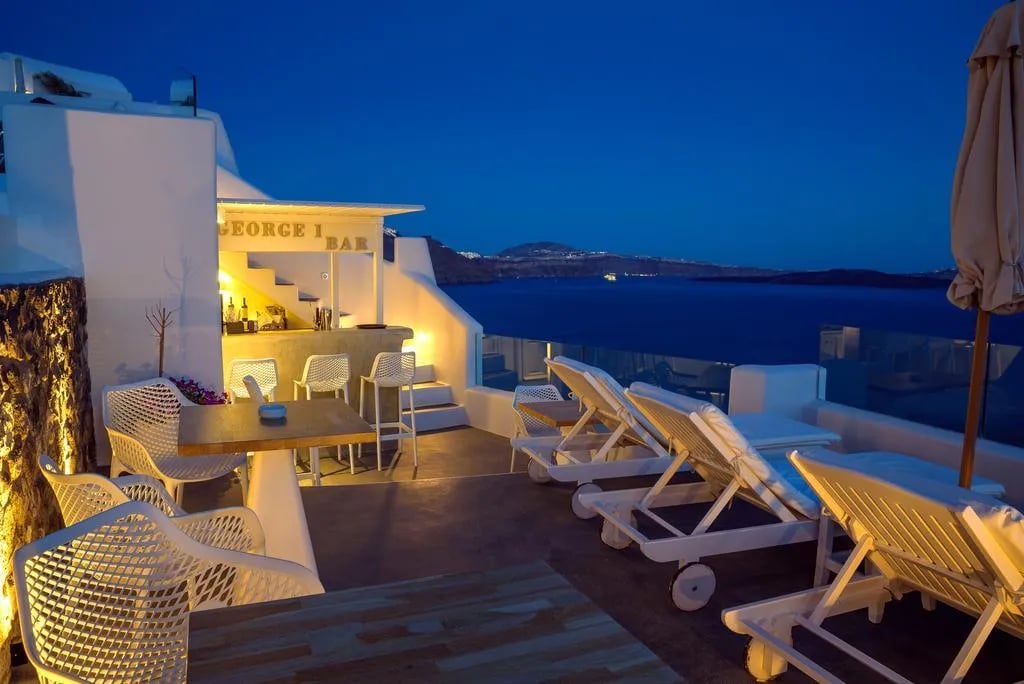 La Perla Villas and Suites, at the table