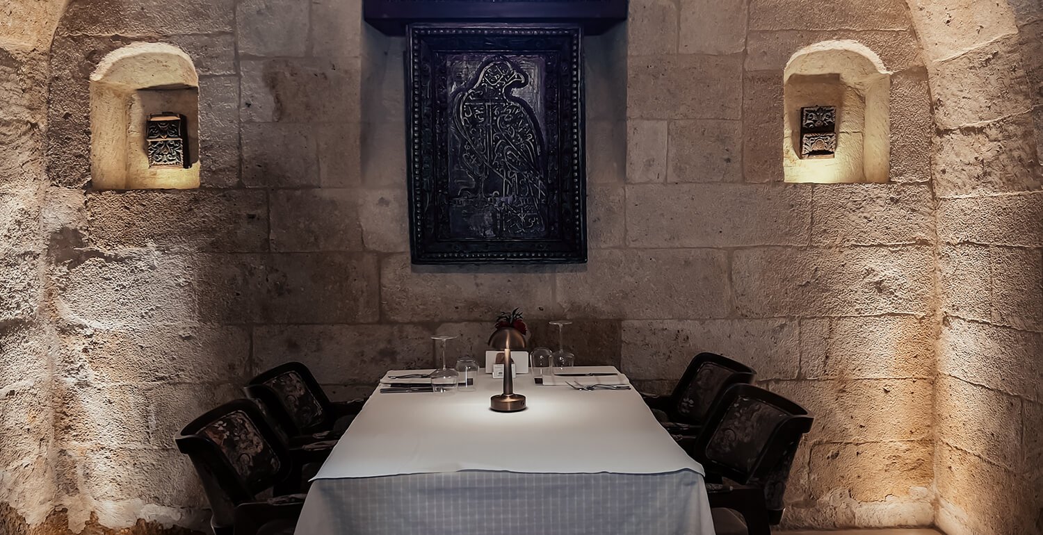Kayakapi Premium Caves - Cappadocia, at the table
