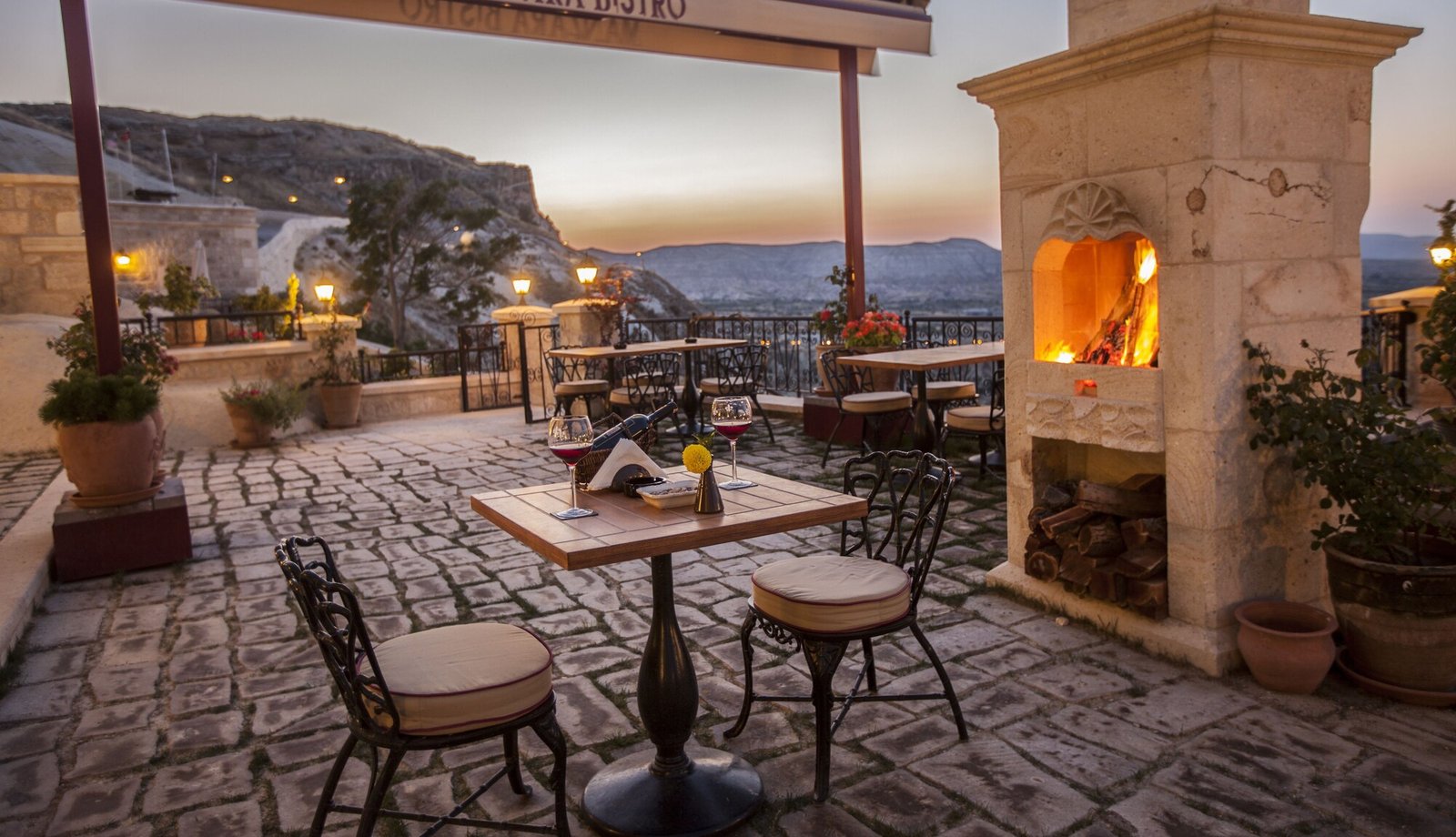 Kayakapi Premium Caves - Cappadocia, at the table