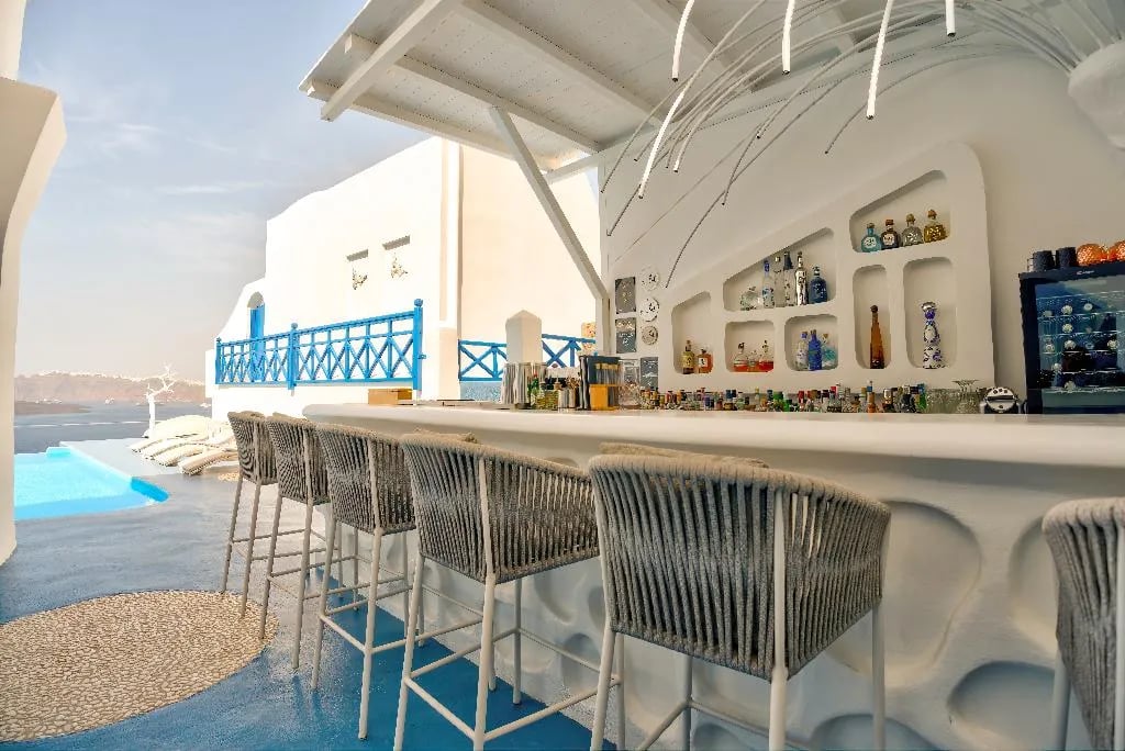 Astarte Suites, at the table