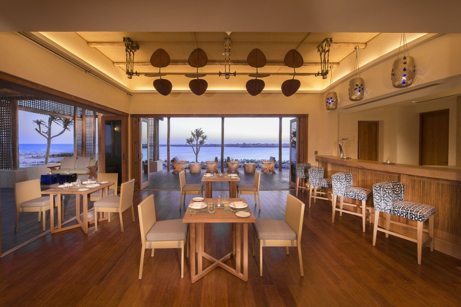 Desert Islands Resort & Spa by Anantara, at the table