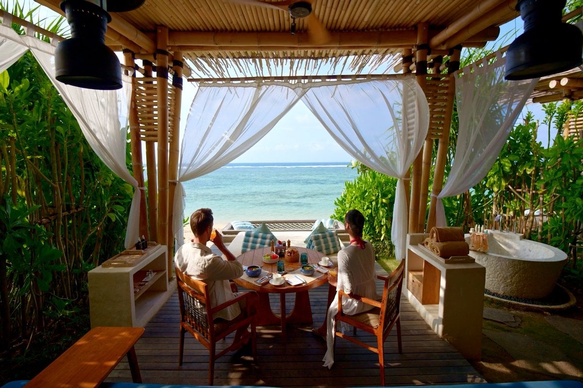 Samabe Bali Suites & Villas, at the table