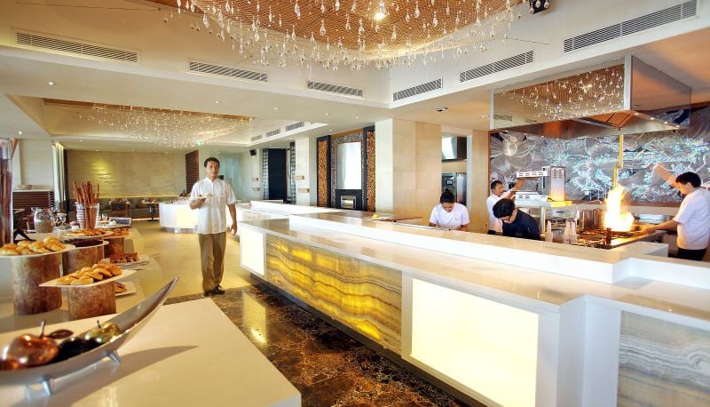 Samabe Bali Suites & Villas, at the table