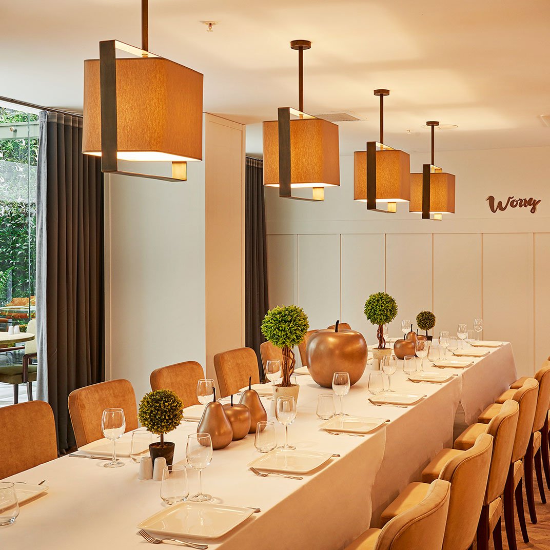Manna Boutique Hotels, at the table