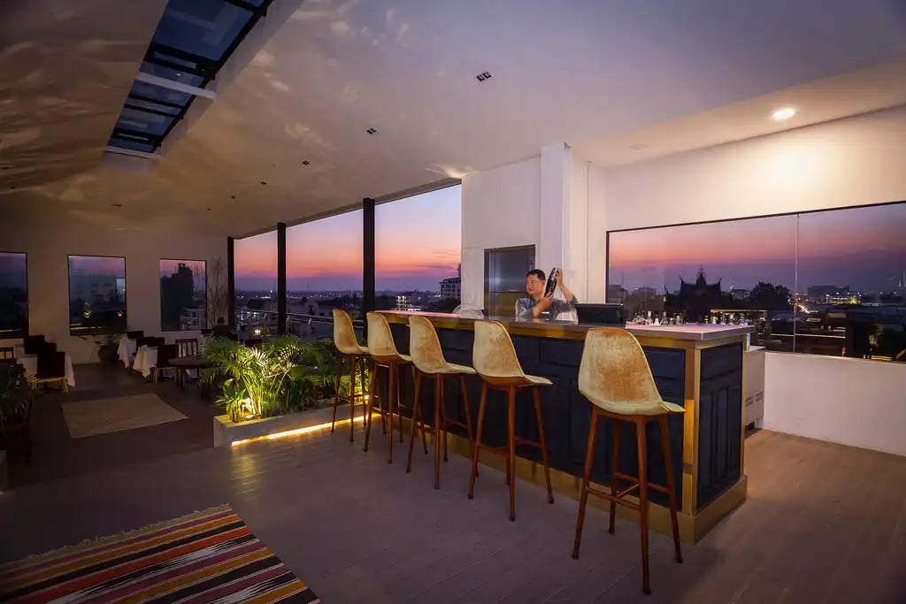 Lao Poet Hotel, at the table